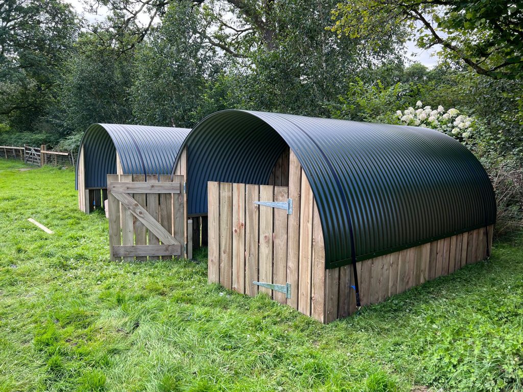 Due to the constant weather changes we always recommend that you place Hurricane screws at corners of the pods and strap over the pods.We stock hurricane anchor screw which can be added as an optional extra.These are screwed into the ground with the aid of the anchor driver and the pods are strapped to the anchors.